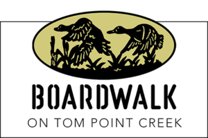 boardwalk on tom point creek logo